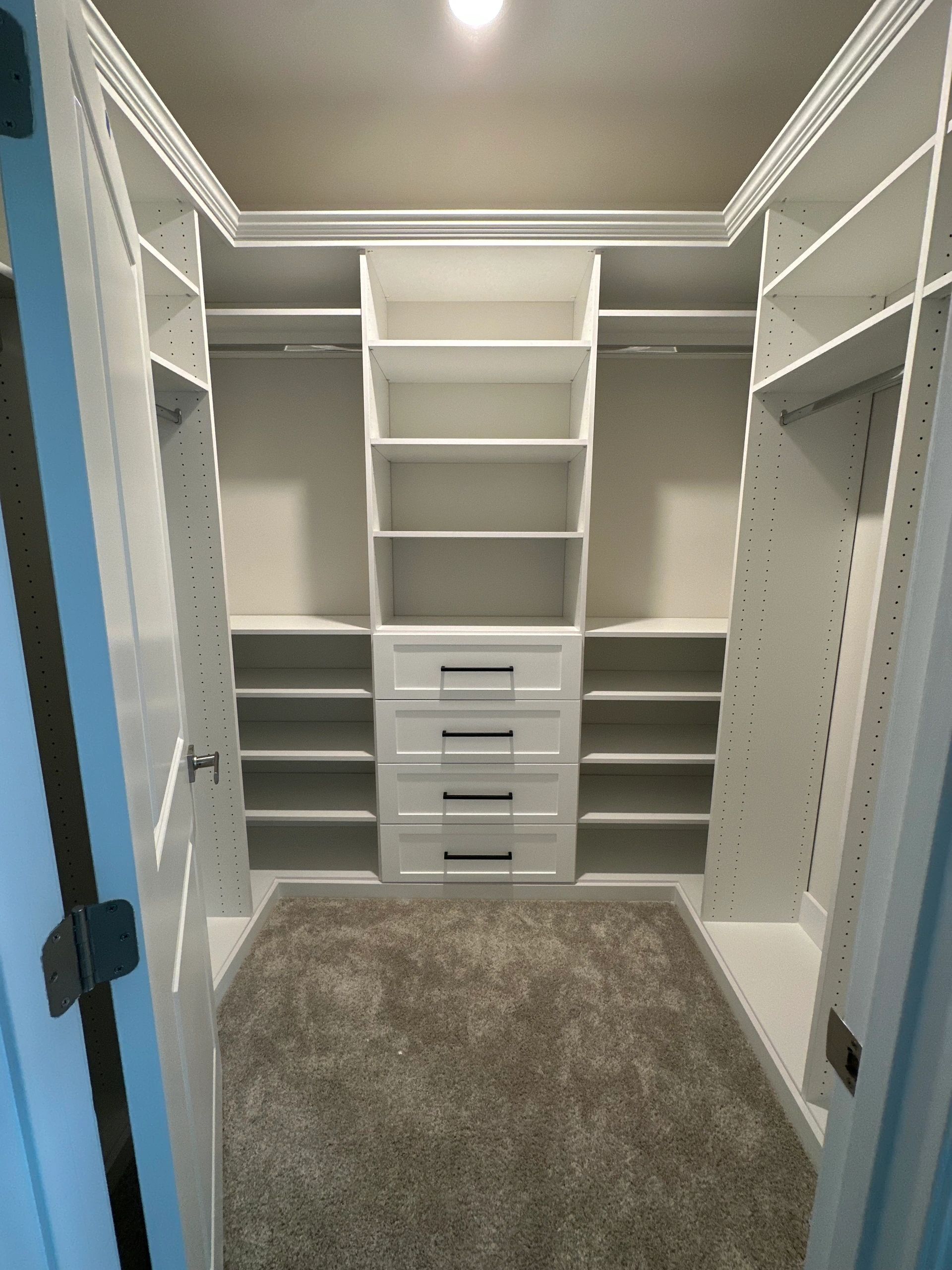 Large custom walk-in closet built-in drawers Fantasy Closets