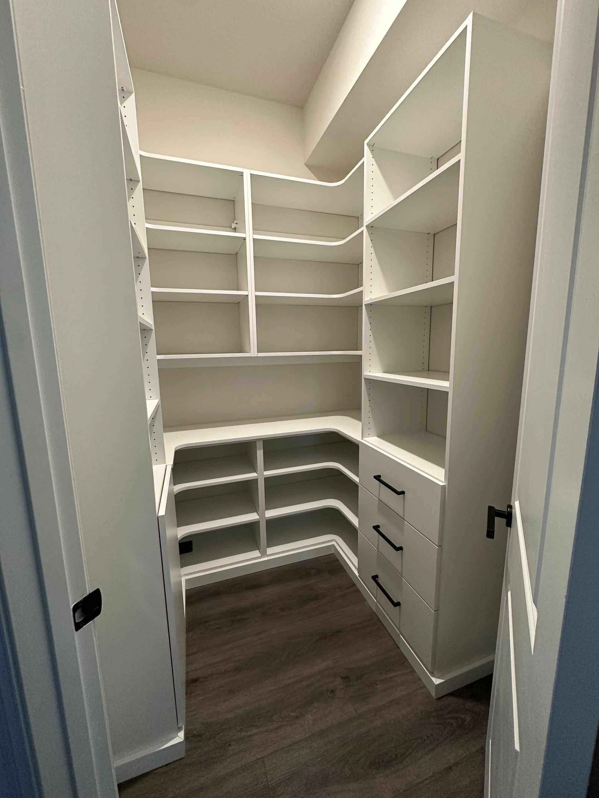 Custom pantry storage pull-out shelves Fantasy Closets