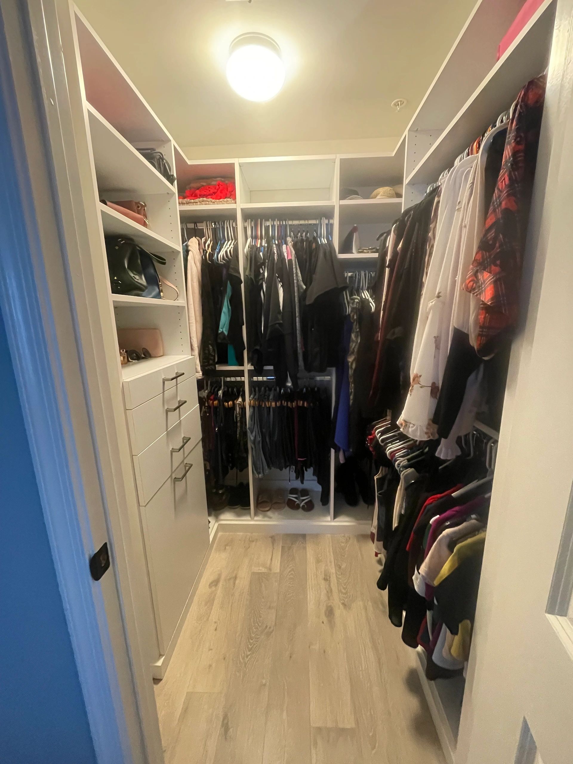 Custom walk-in closet double hanging rods Fantasy Closets