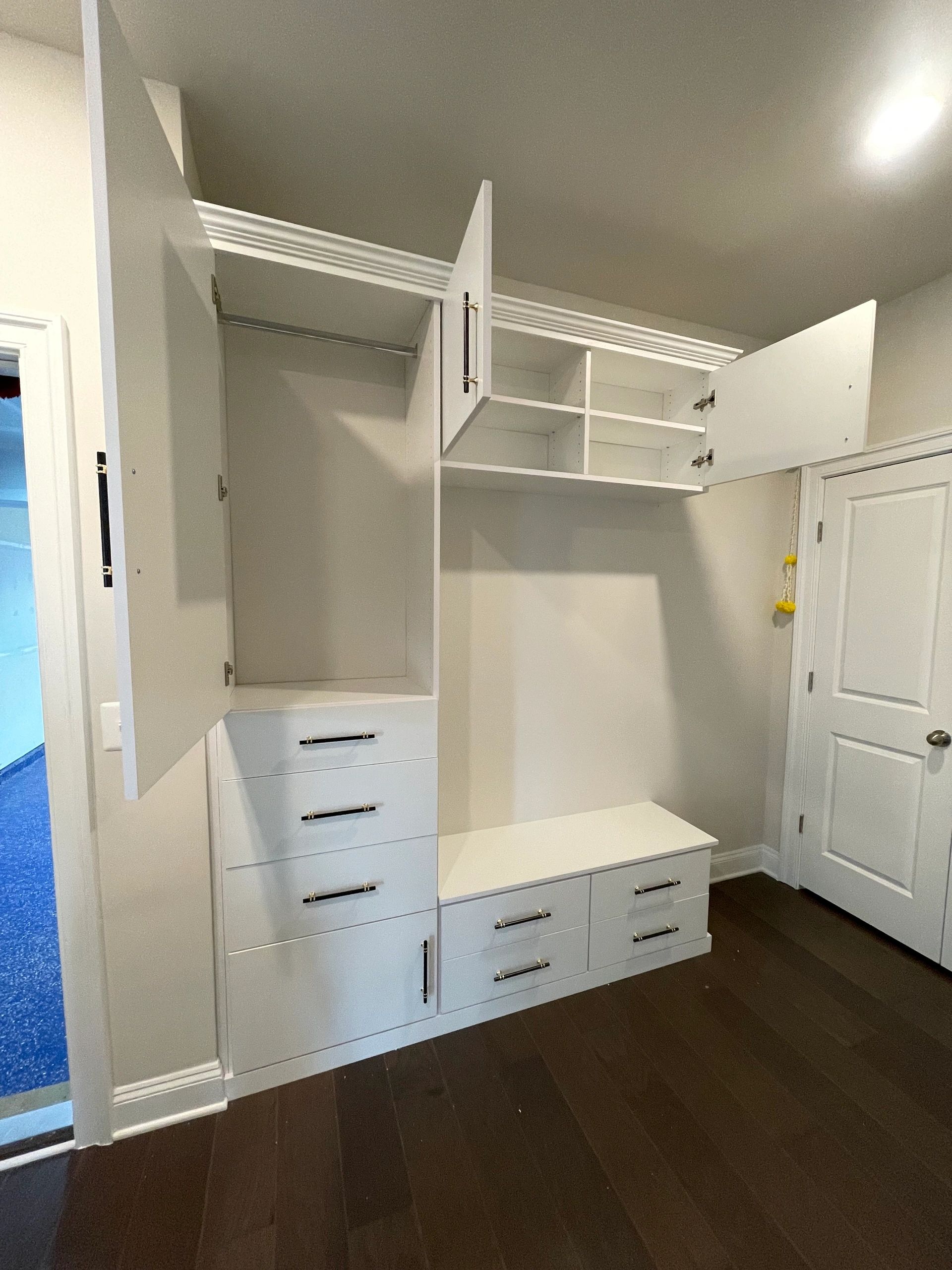 Custom mudroom open shelving multiple drawers Fantasy Closets Virginia
