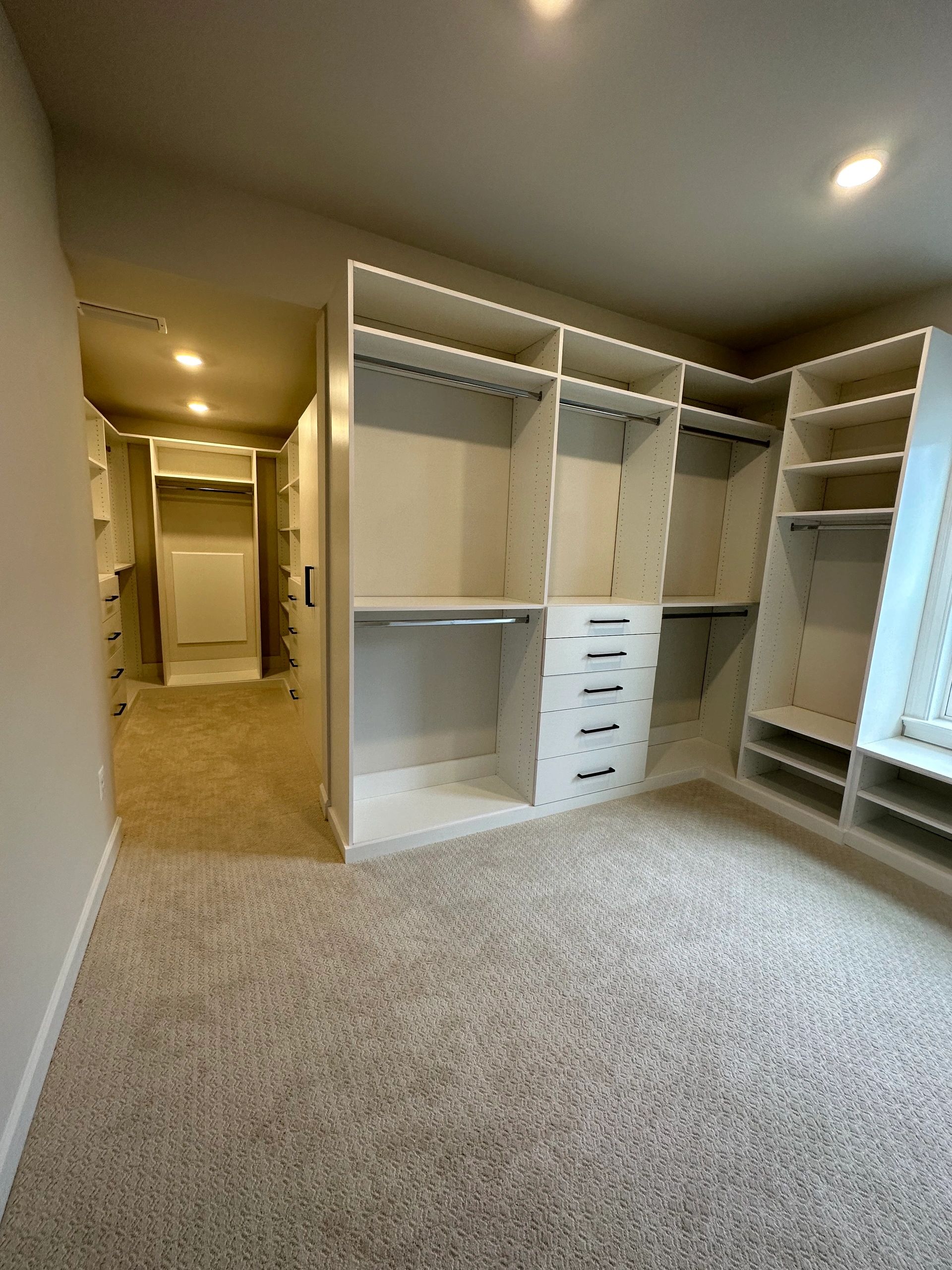 Walk-in closet hanging space shoe shelves Fantasy Closets