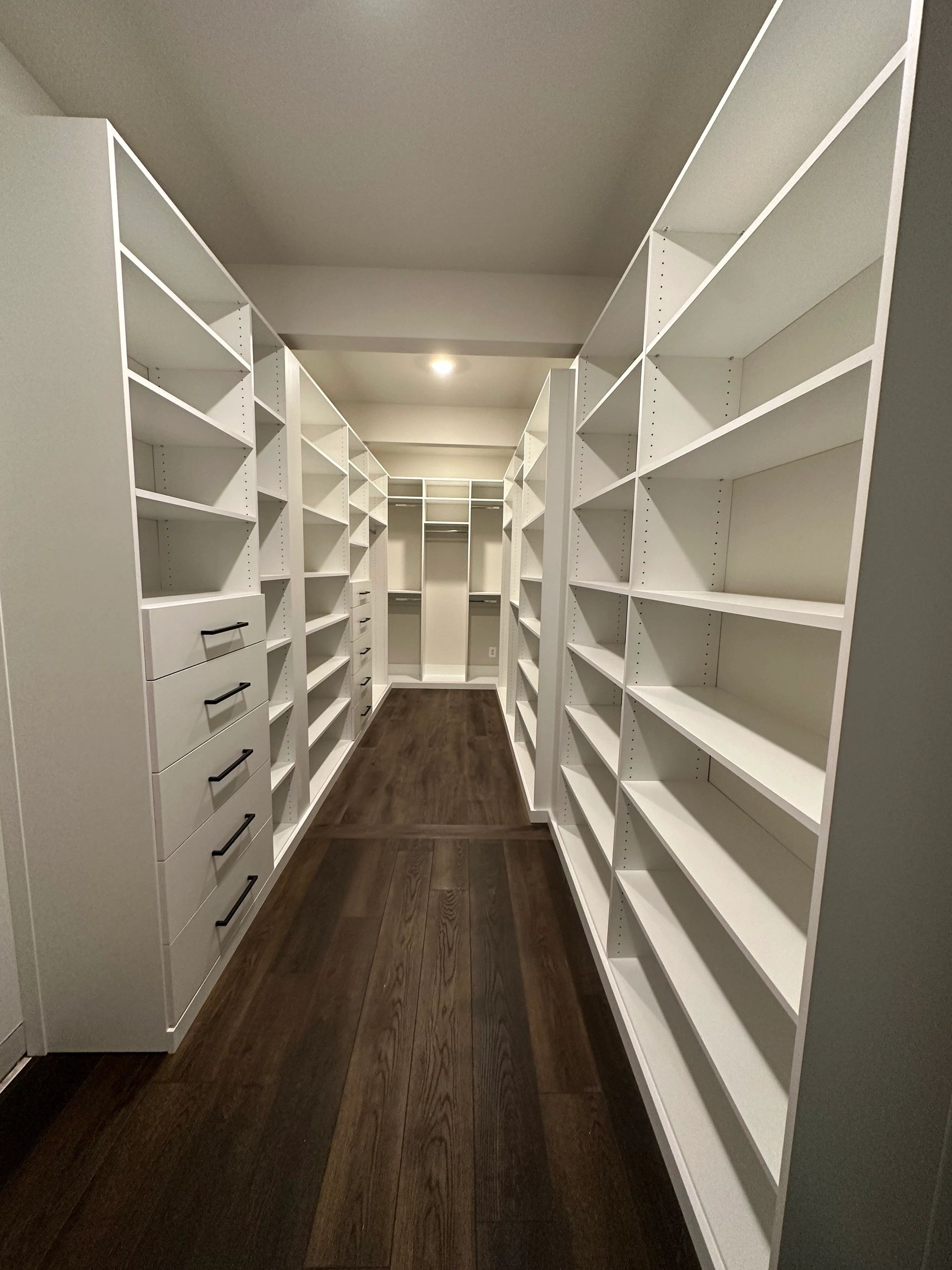 Custom walk-in closet white shelving Fantasy Closets Northern Virginia