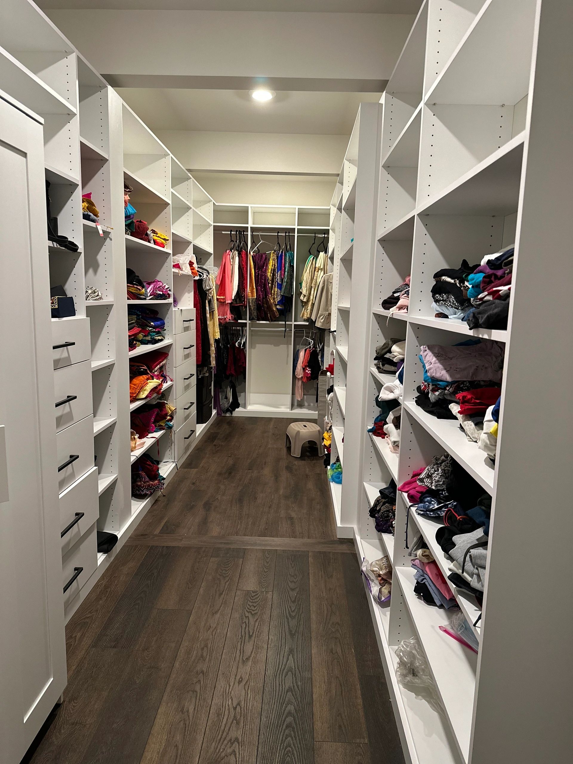 Custom walk-in closet double hang rods Fantasy Closets