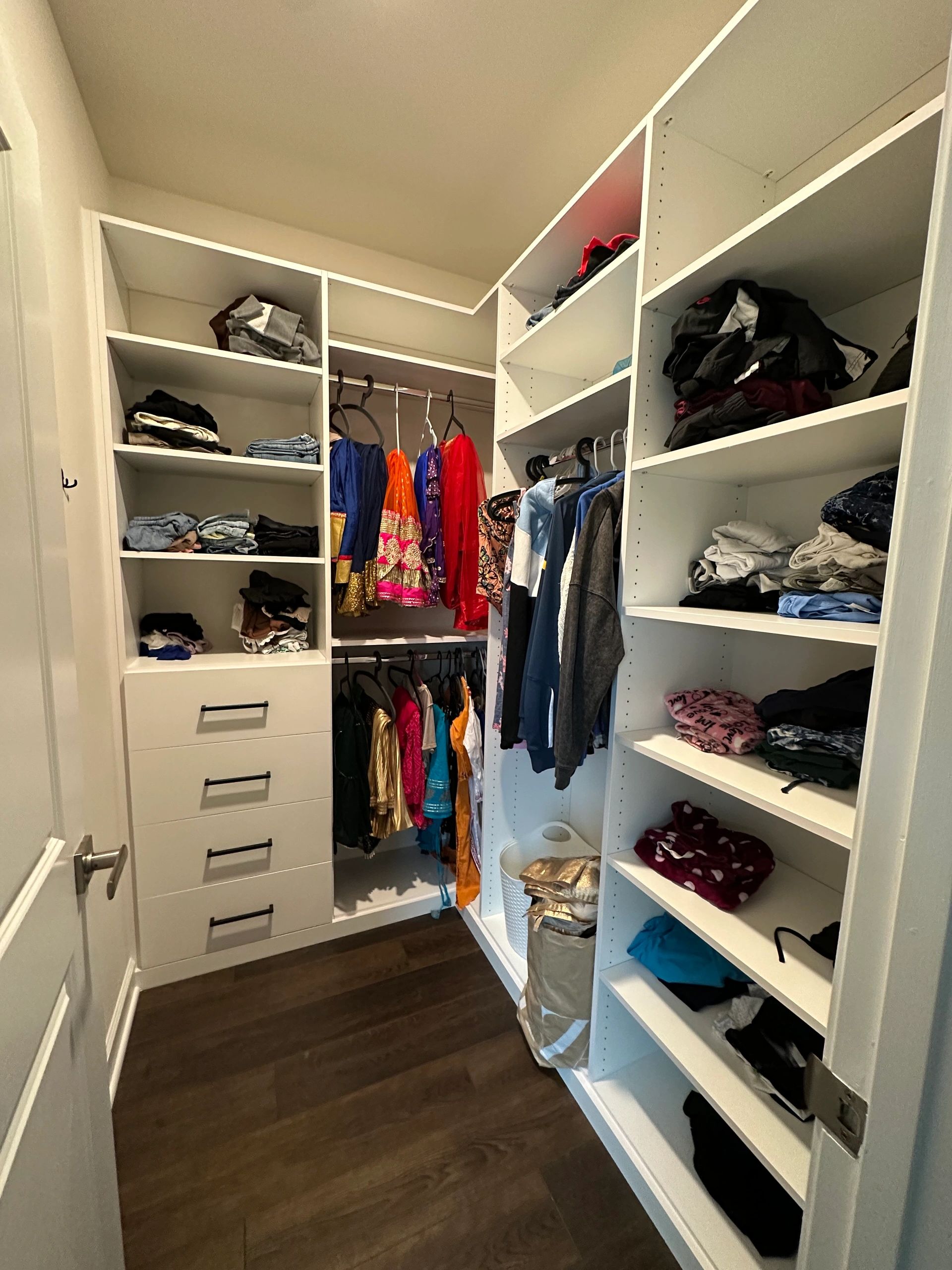 Custom walk-in closet white cabinetry Fantasy Closets