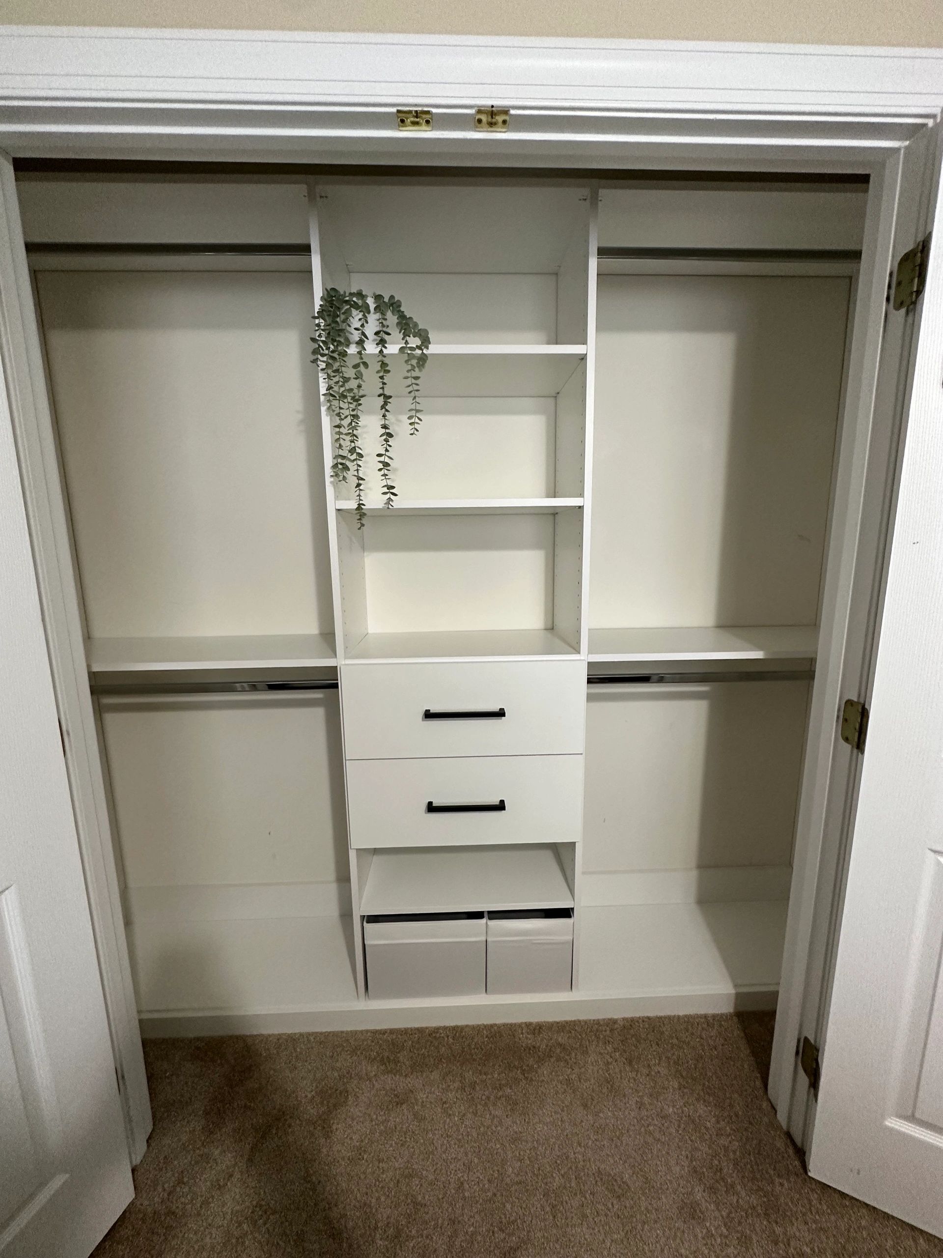Custom reach-in closet system white shelving