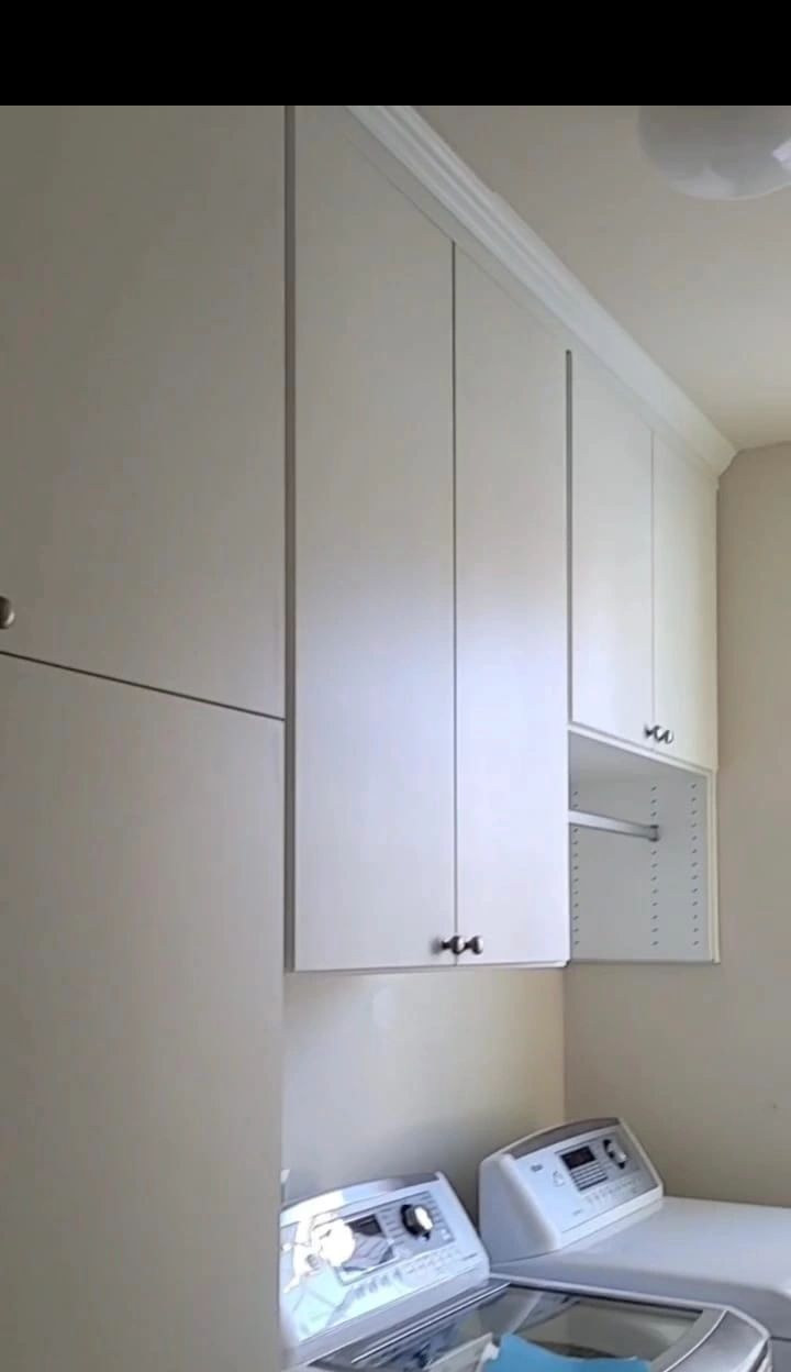 Custom laundry room cabinets Fantasy Closets Virginia